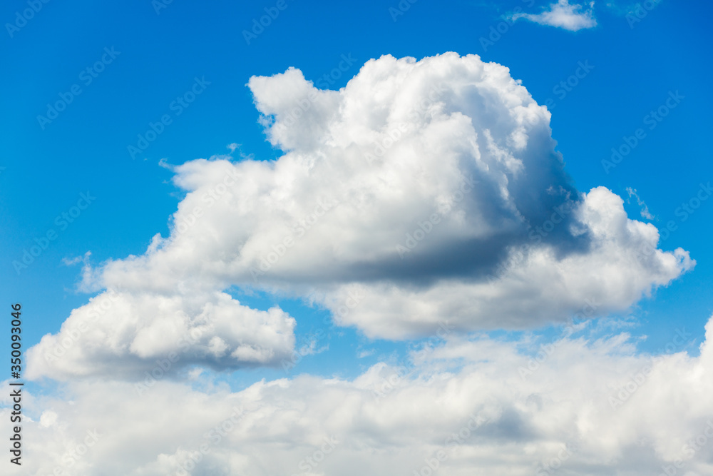 Panoramic fluffy clouds in the blue sky