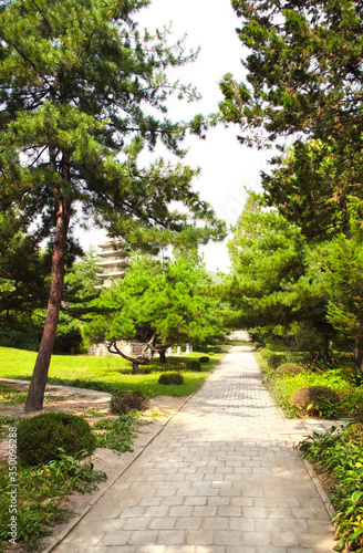 Stone buddhist pagoda in ornamental garden  Kesson  North Korea