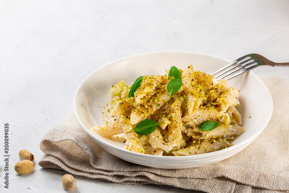Sicilian ricotta cheese and pistachio pasta, with zucchini and basil