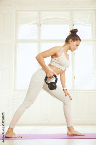 Beautiful brown haired fitness woman