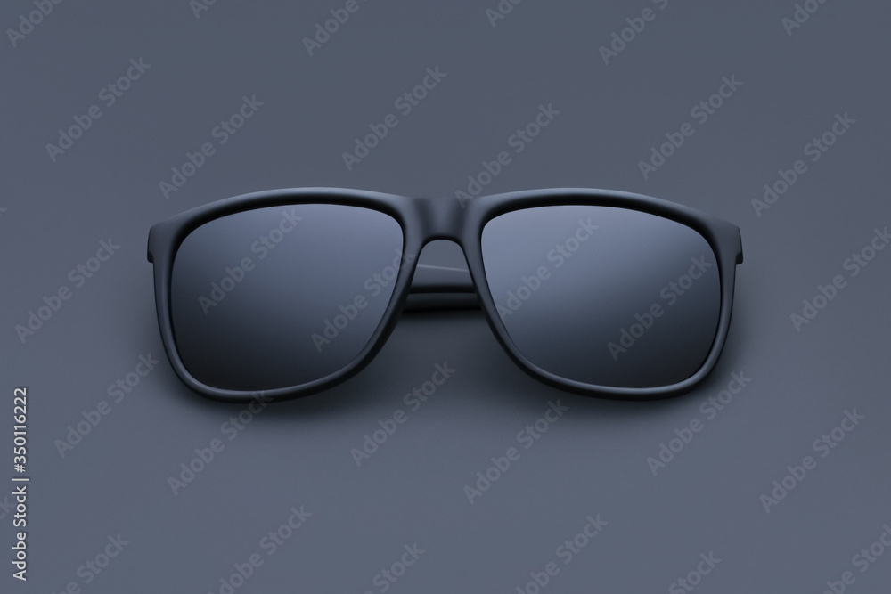 Front view of modern folded sunglasses on a black background Front view of modern folded sunglasses on a black background