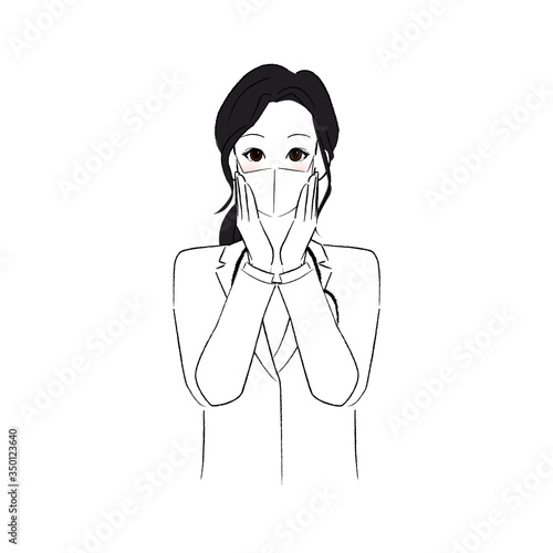 マスクをして頬に両手を添える女性医師