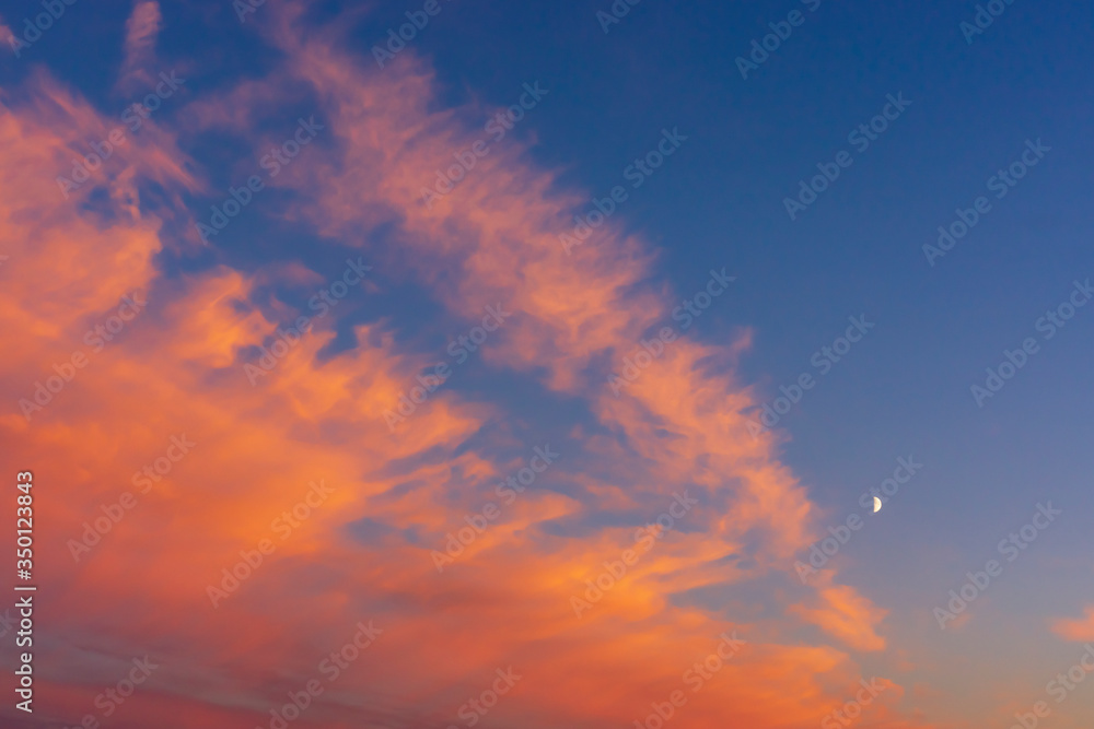 Summer sunset colors on crimson clouds during the white nights