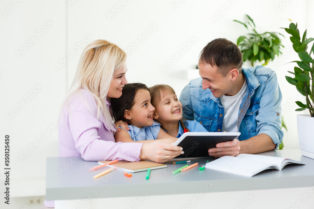 Family Working At Laptop With In Home Office Family Working At Laptop With In Home Office