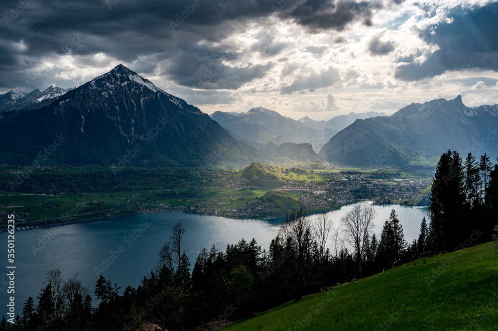 dramatic light on Lake Thun and over Thun seen from over Sigriswil