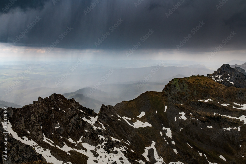 view from the peak of Sigriswiler Rothorn during a thunderstorm