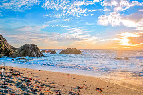 Sunset in Bodega Beach, Sonoma County, California. One of the famous beach of North California. Very exiciting and wonderful beach to enjoy with friends and family and you can enjoy amzing sunset too. photo