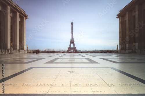 Beautiful cityscape urban street view of the Eiffel tower in Paris, France, on a spring day, seen from Trocadero square © dennisvdwater