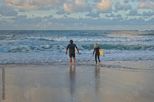 Surfer catching waves on the Sunshine Coast in Australia.