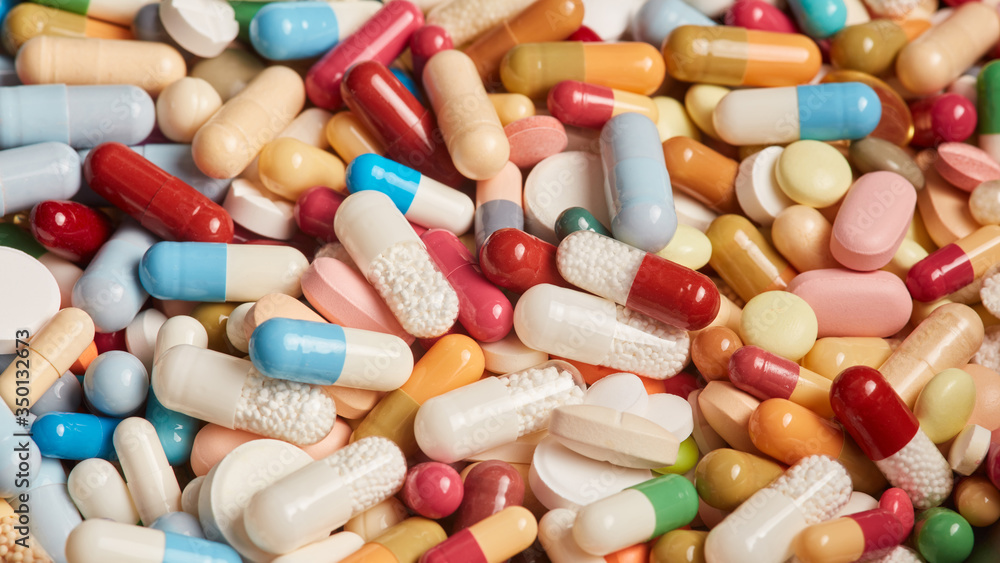 Viele bunte Medikamente und Pillen und Tabletten Viele bunte Medikamente und Pillen und Tabletten