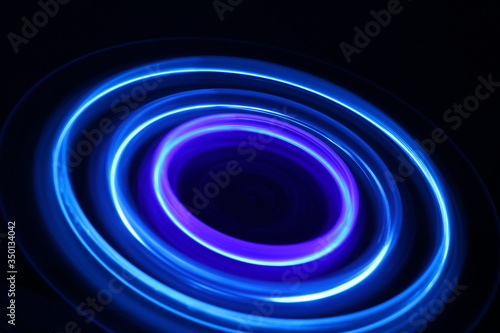Circular blue pattern formed by spinning LED bulbs