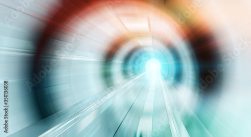 Abstract zoom effectin a bright tunnel background with traffic lights photo