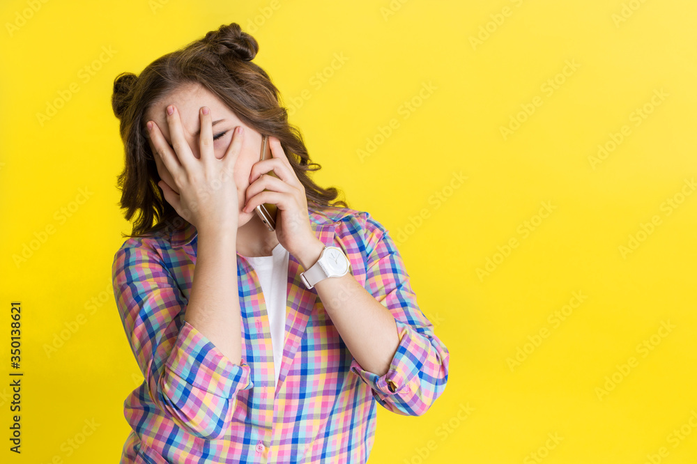 Girl is talking on the phone with frustrated feelings Girl is talking on the phone with frustrated feelings