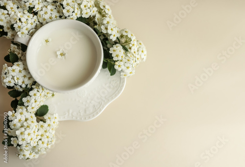 milk and white flowers background photo