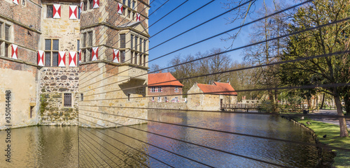 Panorama of Burg Vischering reflected in the mirror in Ludinghausen, Germany photo