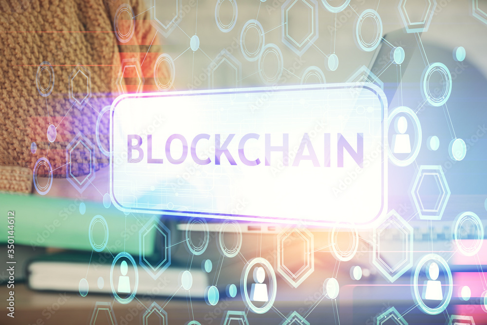 Double exposure of woman hands typing on computer and crypto market theme hologram drawing. Blockchain concept. Double exposure of woman hands typing on computer and crypto market theme hologram drawing. Blockchain concept.