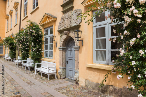 Door and benches on the courtyard of Eutin castle in Germany