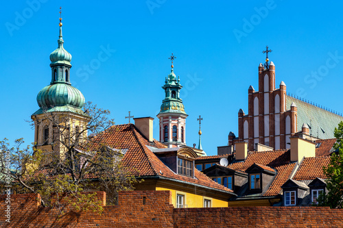 Panoramic view of St. Martin’s Church - kosciol Sw. Marcina - and St. John’s Cathedral over Starowka Old Town quarter of Warsaw, Poland photo