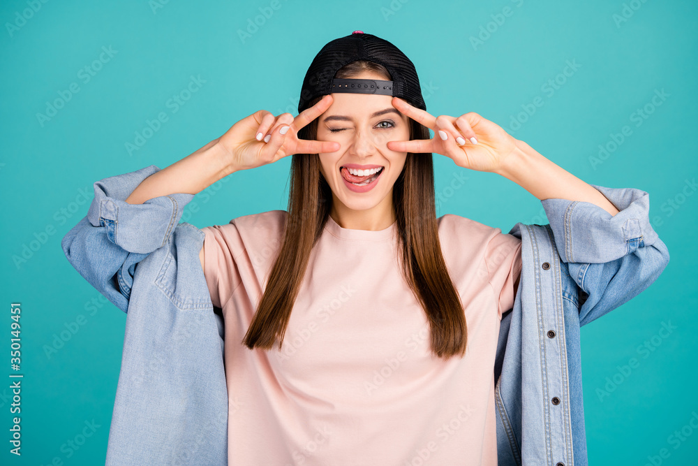 Close-up portrait of nice-looking attractive lovely cute cheerful cheery straight-haired girl showing v-sign on eyes licking lip having fun isolated on bright vivid shine vibrant blue color background Close-up portrait of nice-looking attractive lovely cute cheerful cheery straight-haired girl showing v-sign on eyes licking lip having fun isolated on bright vivid shine vibrant blue color background