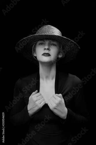 portrait of a sad woman with hat