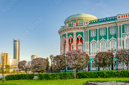 Blooming Apple trees in spring near the house of Sevastyanov built in the 19th century in Yekaterinburg. photo