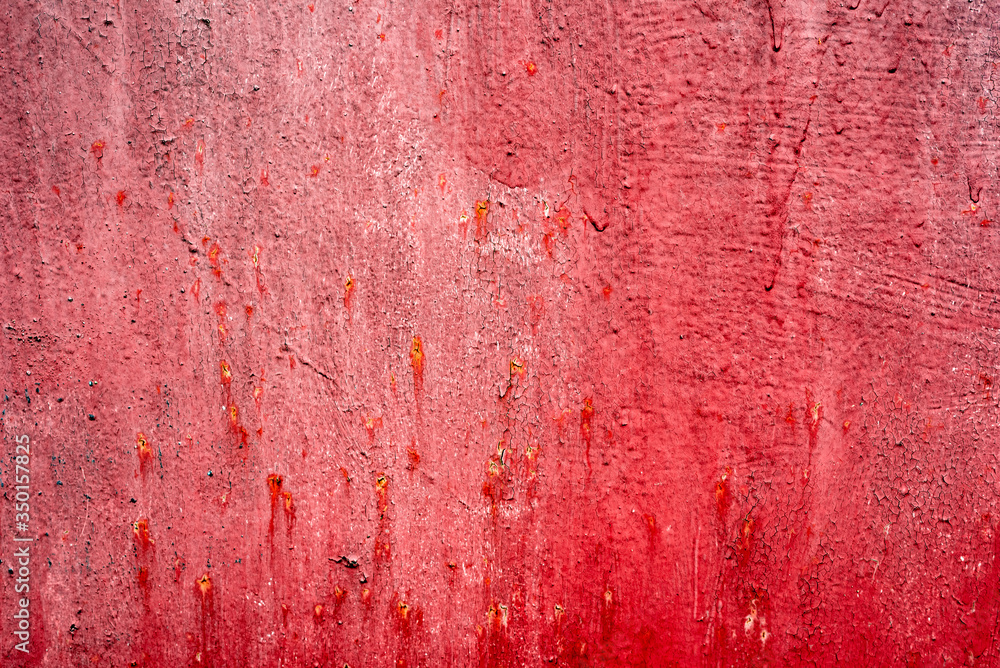 Texture of a metal wall with cracks and scratches which can be used as a background Texture of a metal wall with cracks and scratches which can be used as a background