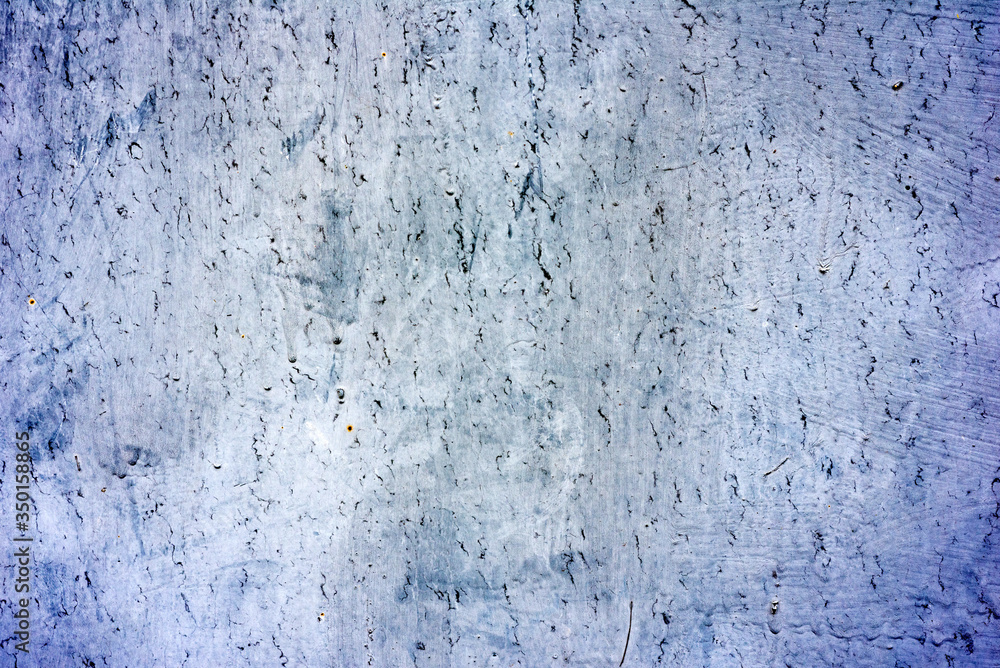 Metal texture with scratches and cracks which can be used as a background Metal texture with scratches and cracks which can be used as a background