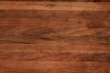 The texture of the countertop is dark brown wood with space for text signatures. The wooden surface is designed in the loft style.