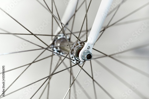 Bicycle wheel closeup front axle hub and fork