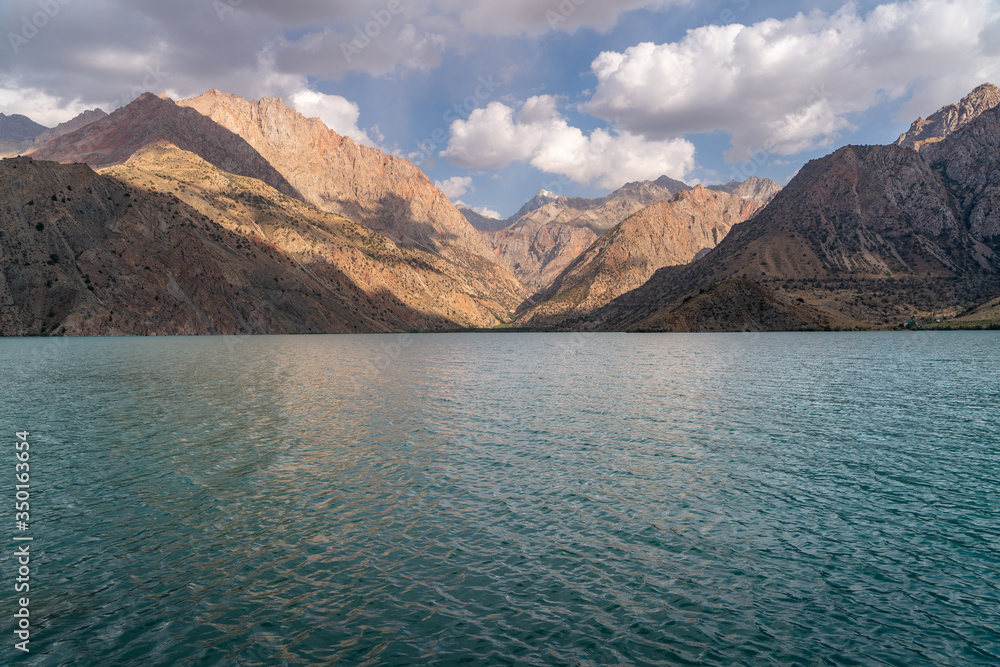 The scenic view of Iskanderkul lake and Fann mountains in Tajikistan