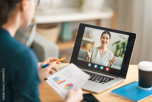 Tableau sur toile woman is using laptop pc for remote conversation