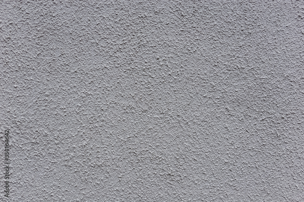 Texture of light stucco, suitable for textures of street walls and facades Texture of light stucco, suitable for textures of street walls and facades