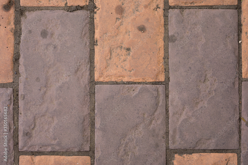 brown rectangular tiled road, closeup top view brown rectangular tiled road, closeup top view