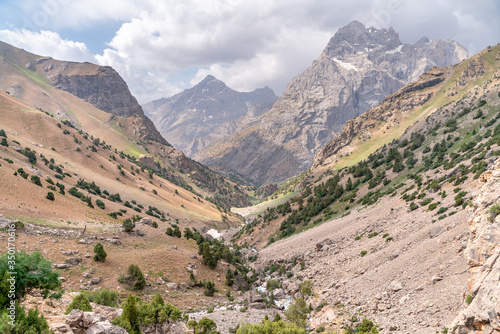 The beautiful view of blue sky and snow mountain summit near to Kaltsit peak in Fann mountains in Tajikistan