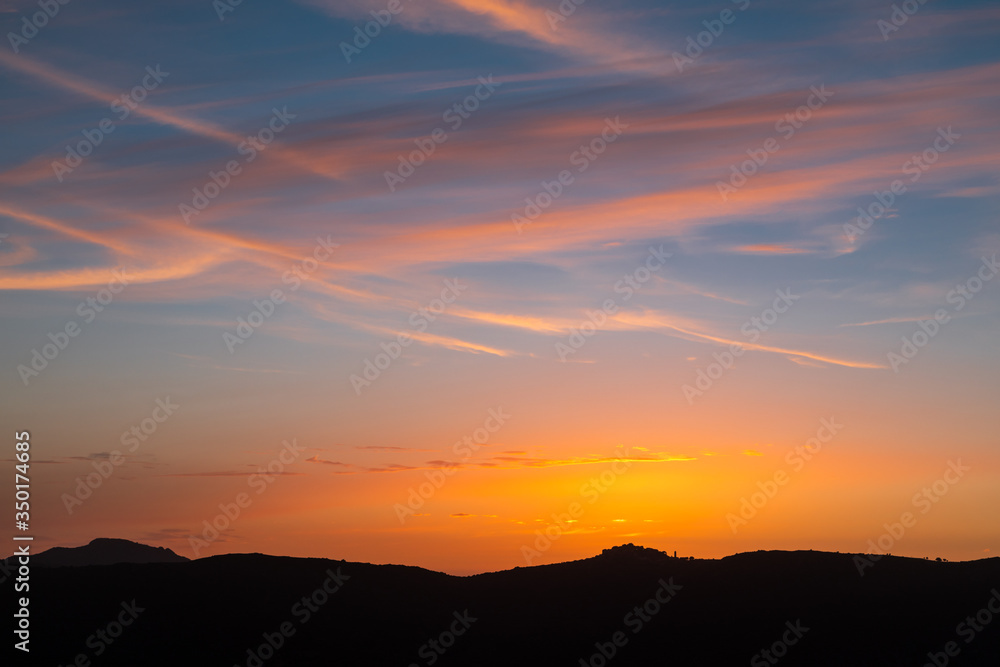 Sunset over village of Sant'Antonino in Corsica