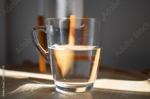 having a fresh wake up in the moring with a glass of water