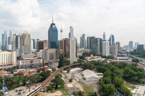 Panoramic view of Kuala Lumpur skyline at day time. City center of capital of Malaysia. Contemporary buildings exterior with glass. © VideoFlow