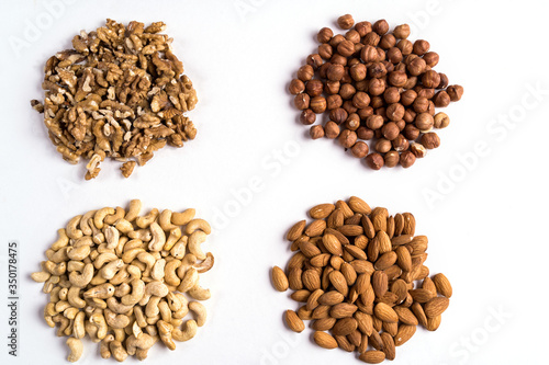 Top view collection of nuts for health, fitness and vitality.