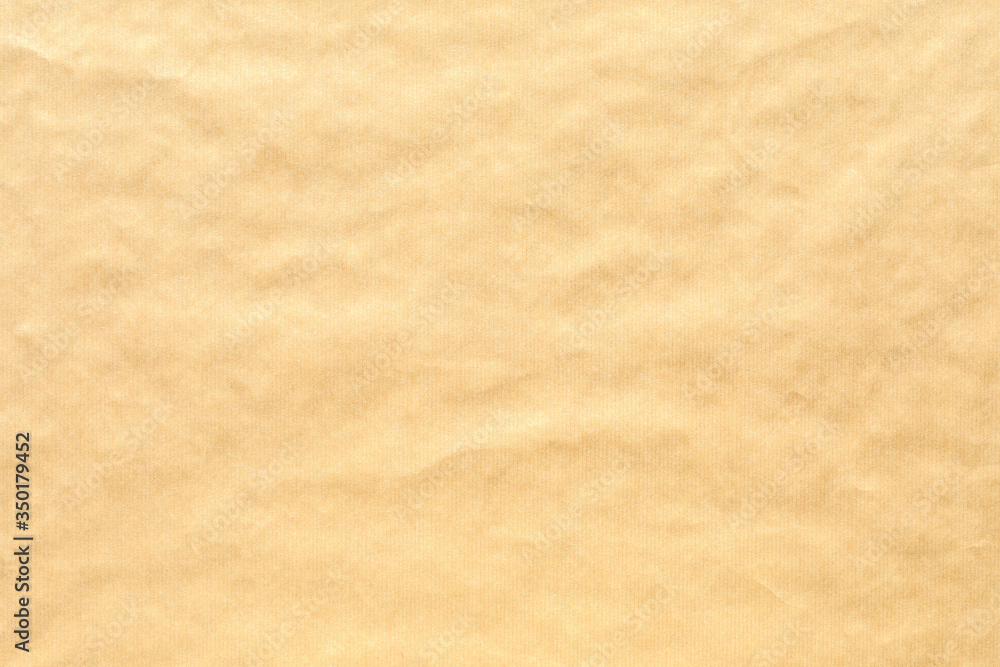 Obraz premium Crumpled brown paper background texture