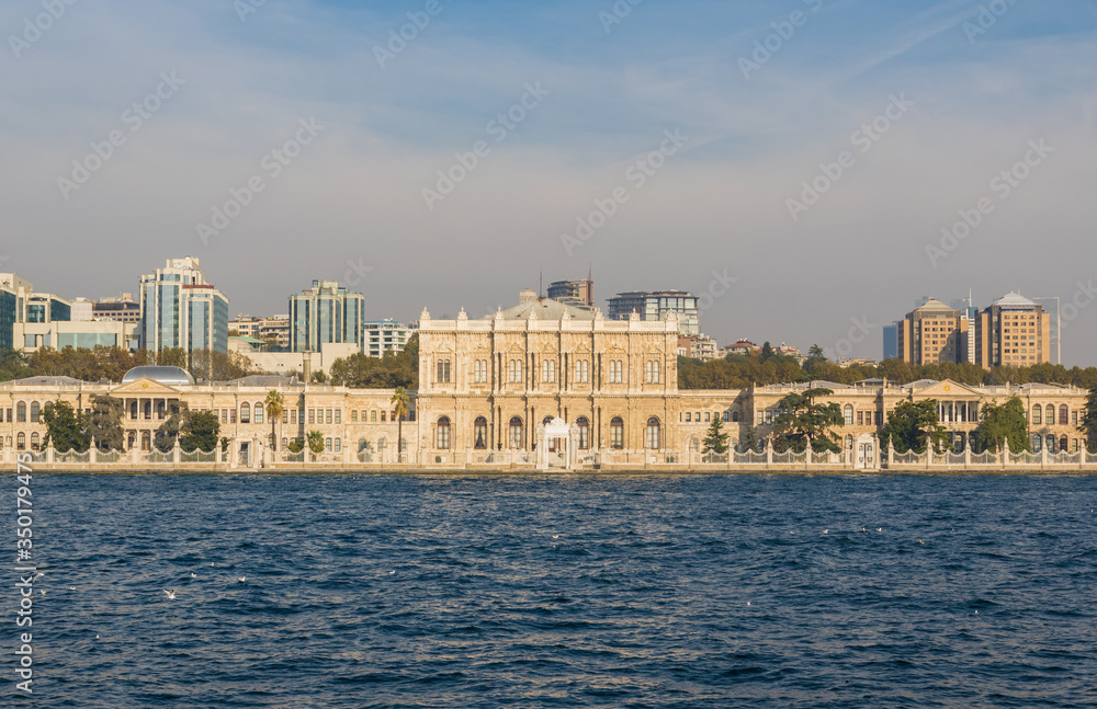 Naklejka premium Istanbul, Turkey - built in 1843, and main administrative center of the Ottoman Empire, the Dolmabahçe Palace is a major tourist attraction. Here in particular its facade