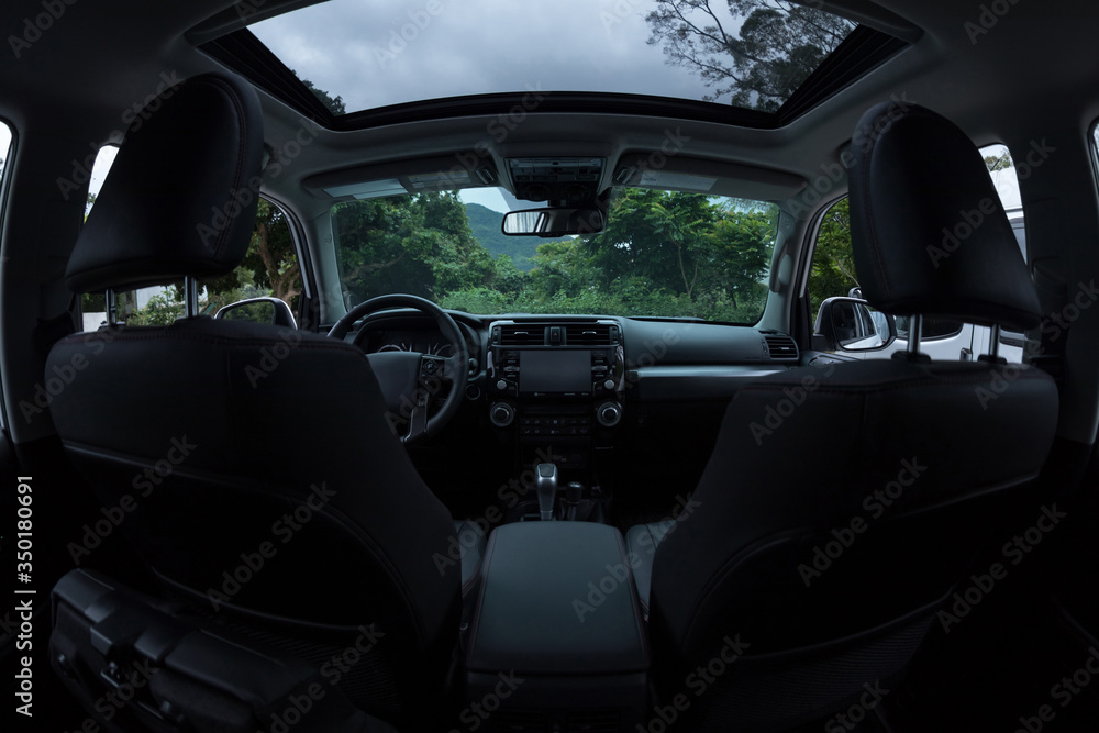 Luxury car in the rainny nature Luxury car in the rainny nature