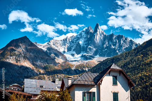 Mountain landscape. Buildings in the Chamonix Valley, Alps, France. © badahos