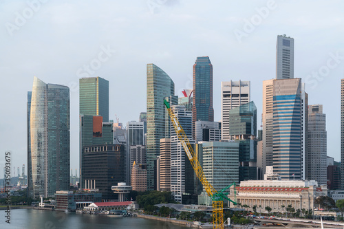 Picturesque panoramic view of Singapore city at day time. Financial and trading center hub in Asia region. Concept of success. Modern buildings in high-tech world.