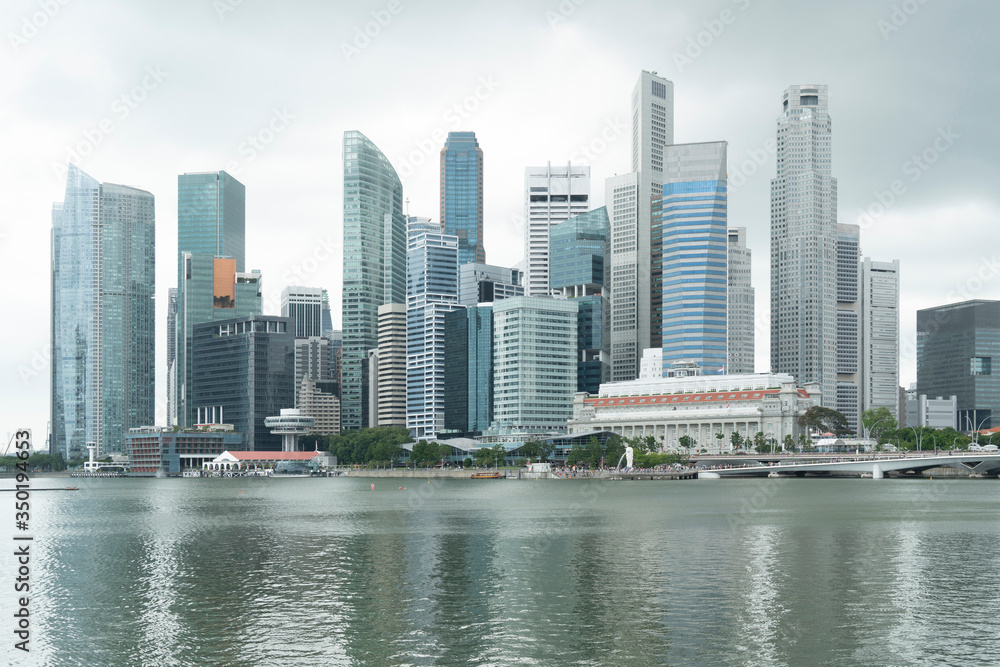 Obraz premium Picturesque panoramic view of Singapore city at day time. Financial and trading center hub in Asia region. Concept of success. Modern buildings in high-tech world.