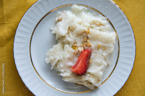 Traditional Turkish Ramadan Dessert Gullac . It is made with gullac (rice wafer or rice paper sheets) , milk, rose water, walnut, vanilla.