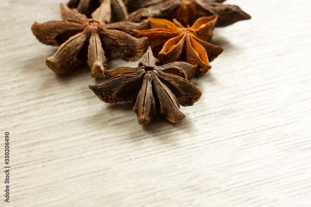 Star anise exotic spice on a wooden table Star anise exotic spice on a wooden table