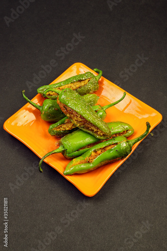 Delicious Mouth Watering Stuffed Green Chili With Gram Flour. Bharma Besan Mirchi. photo