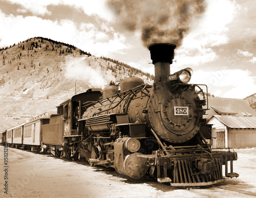 Simulated old Victorian photograph of a steam locomotive	 photo