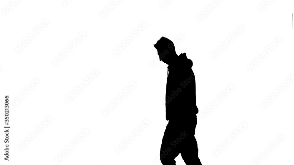 black silhouette on a white background, young energetic guy dancing hip hop, freestyle, street dance. Medium long shot black silhouette on a white background, young energetic guy dancing hip hop, freestyle, street dance. Medium long shot