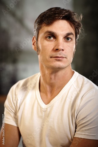 Portrait of casual young man looking at camera. 